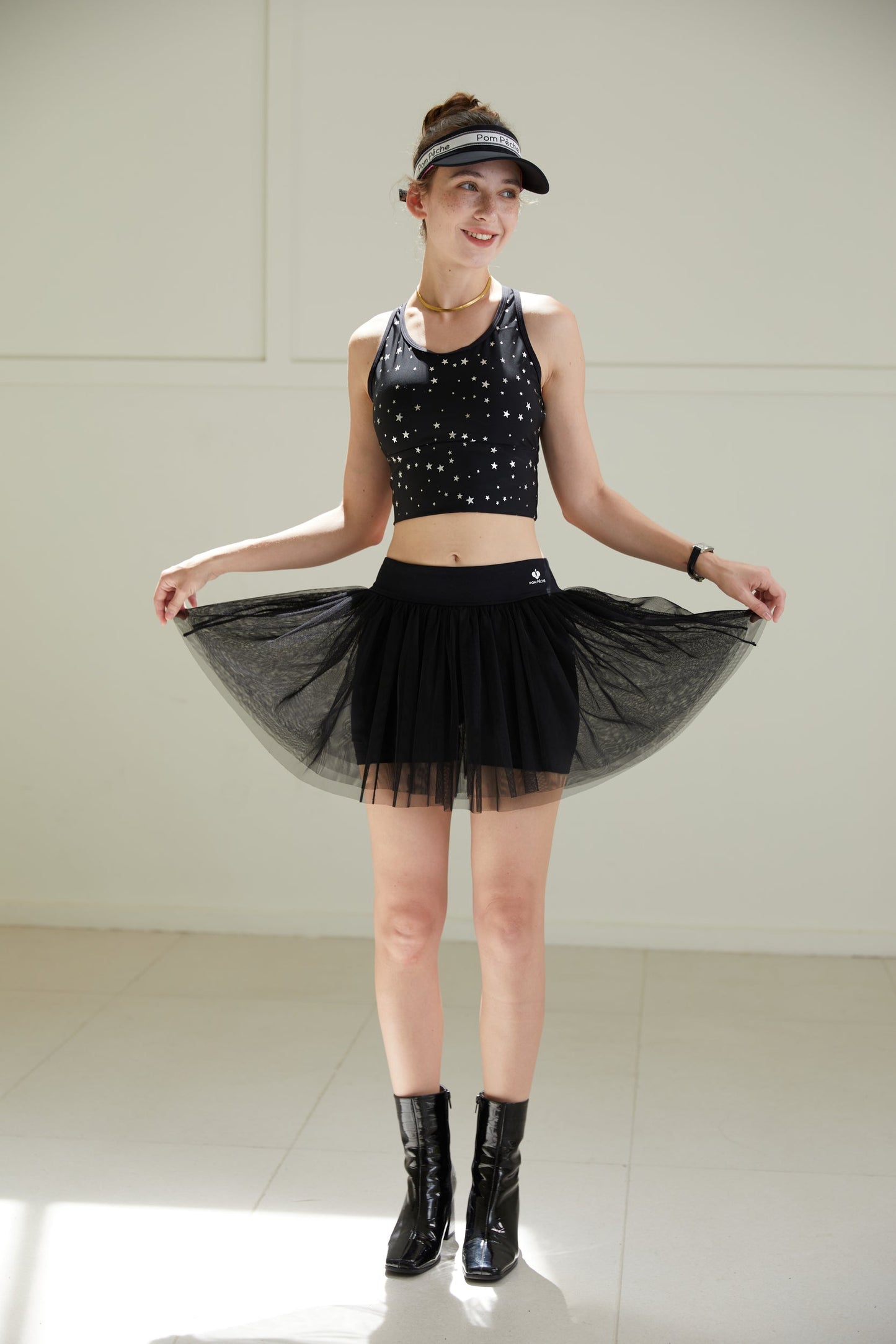Swan Falda de tenis negra de malla de doble capa