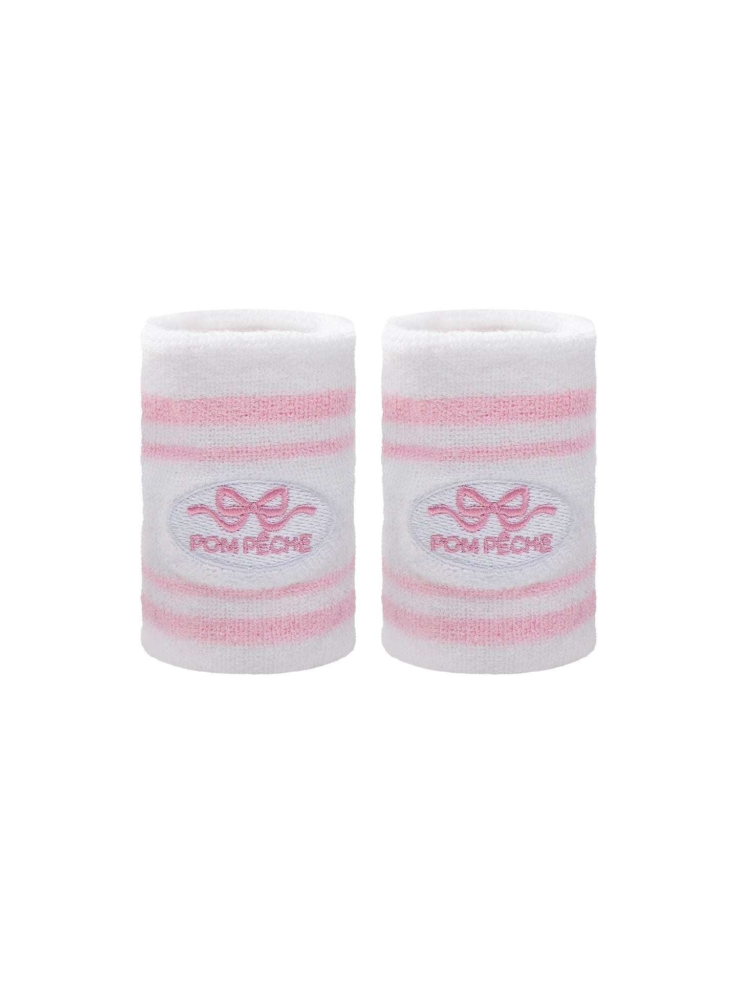 White tennis wristbands with soft pink stripes, featuring embroidered bow and logo details.