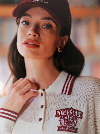 Model wearing long sleeve polo shirt