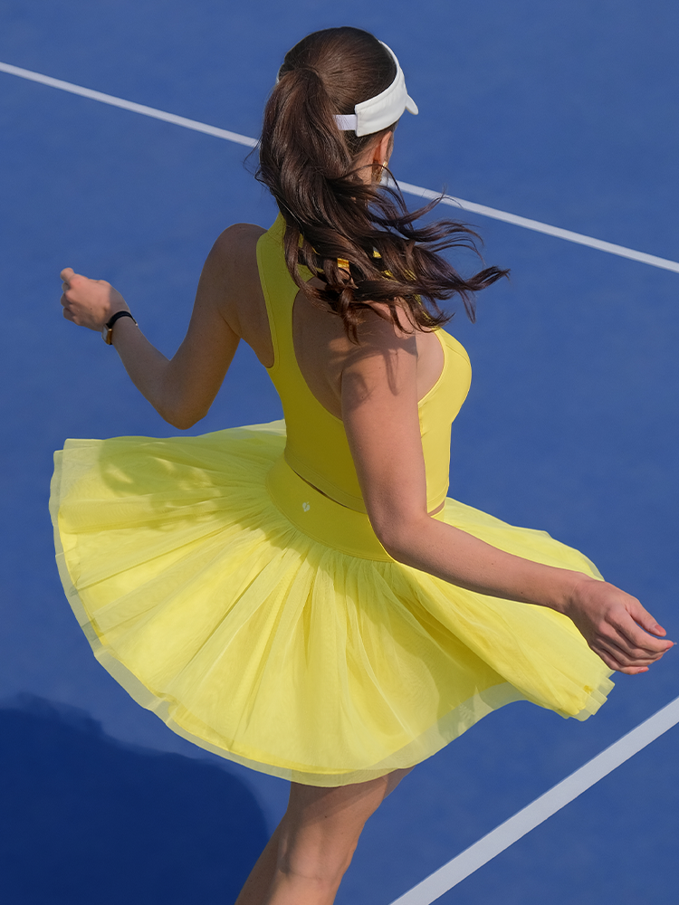 LUMI Falda de tenis amarilla de malla de doble capa