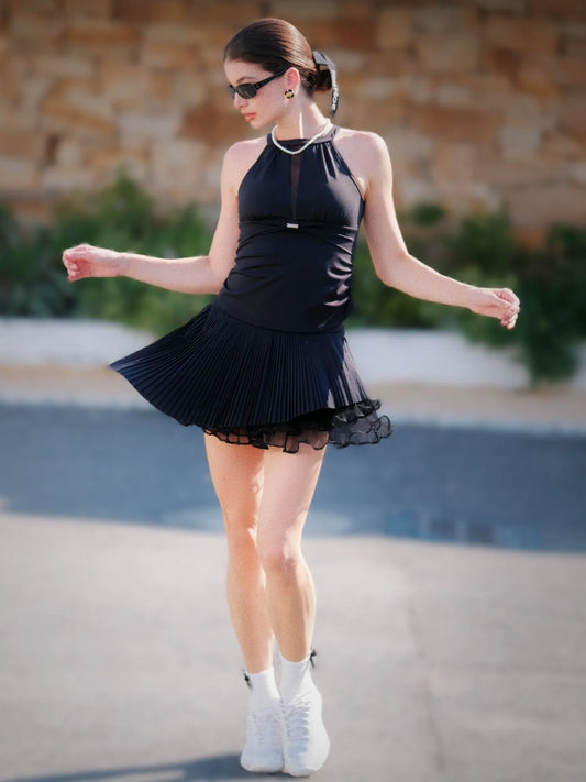 Woman in mesh halter tank - black