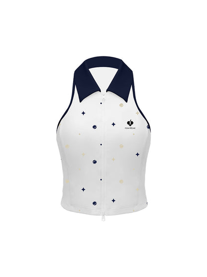 White zip-front tennis tank with navy collar and star print, offering a chic, preppy look for court or city wear.