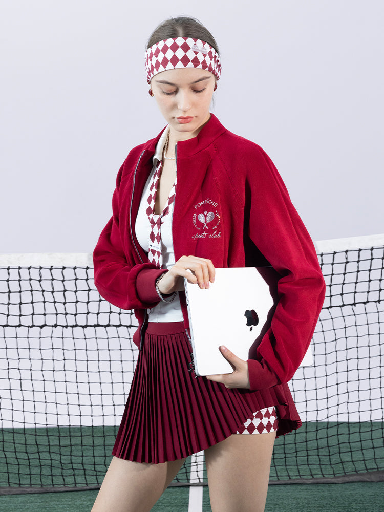 Deep red fleece zip-up jacket with a soft texture and subtle logo detail, offering a polished yet cozy look.