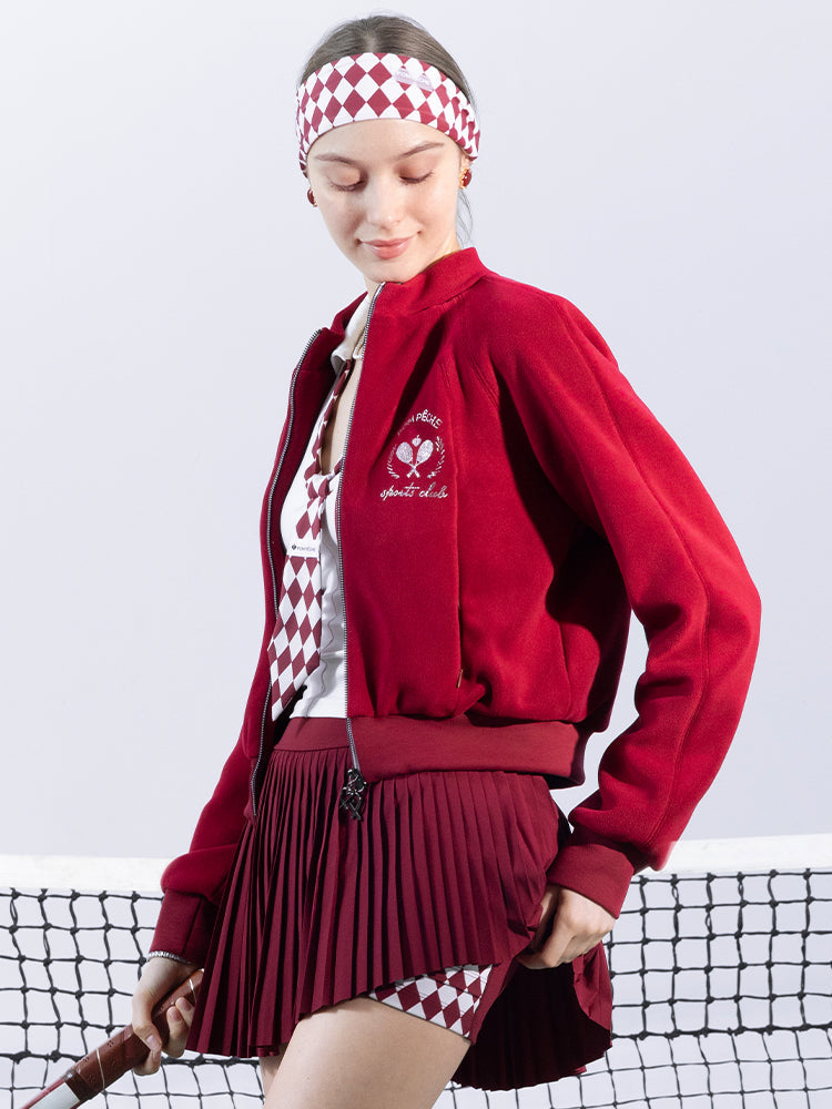 Deep red fleece zip-up jacket with a soft texture and subtle logo detail, offering a polished yet cozy look.
