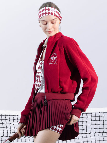 Deep red fleece zip-up jacket with a soft texture and subtle logo detail, offering a polished yet cozy look.